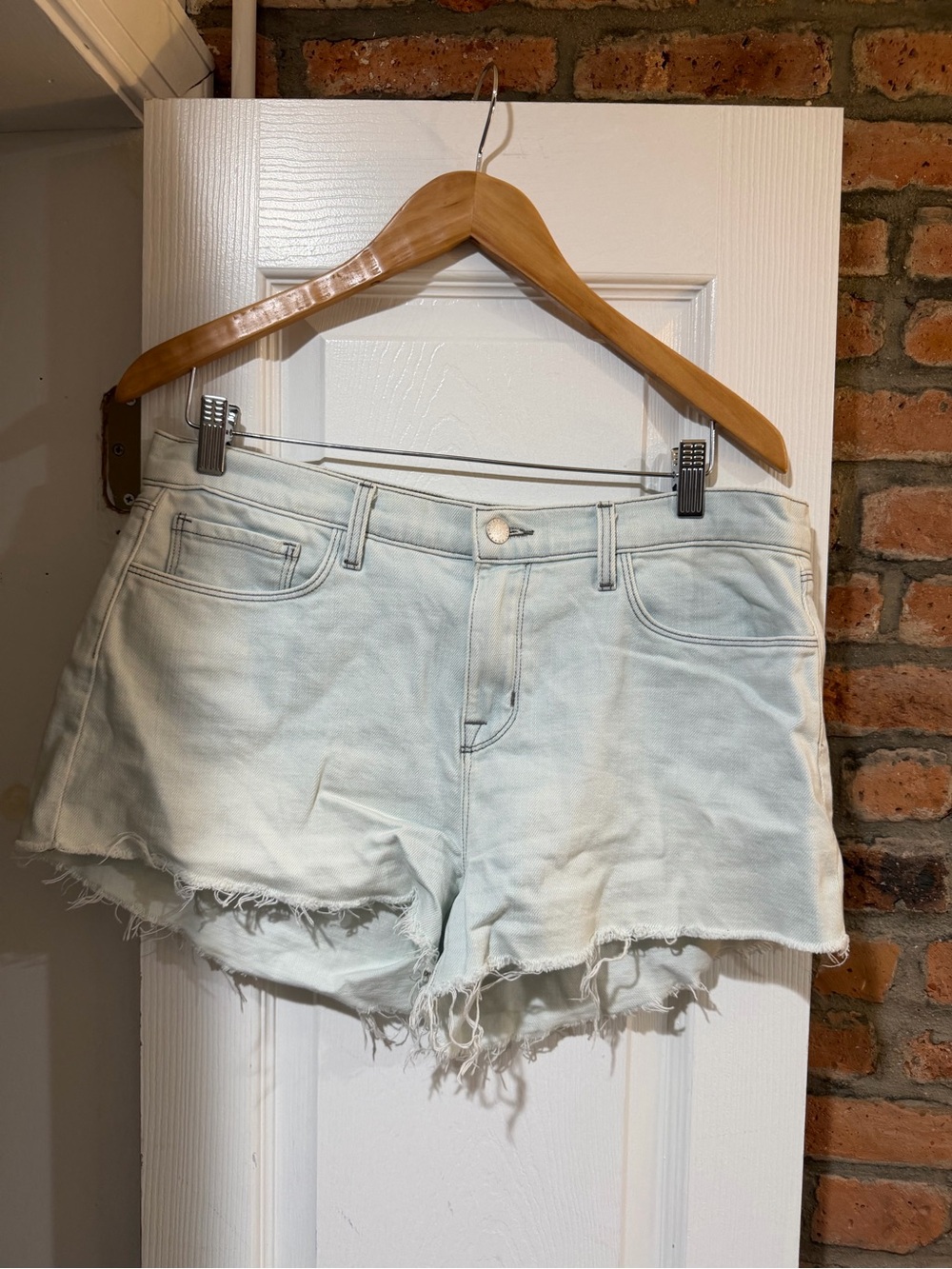 L’Agence mini light blue denim shorts, size 30